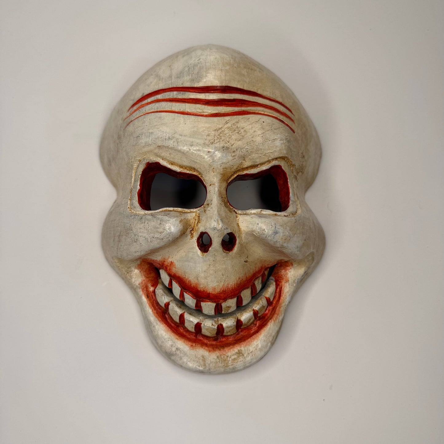 Hand-Carved Wooden Mask with Distinctive Grinning Design – Unique Artisan Craft