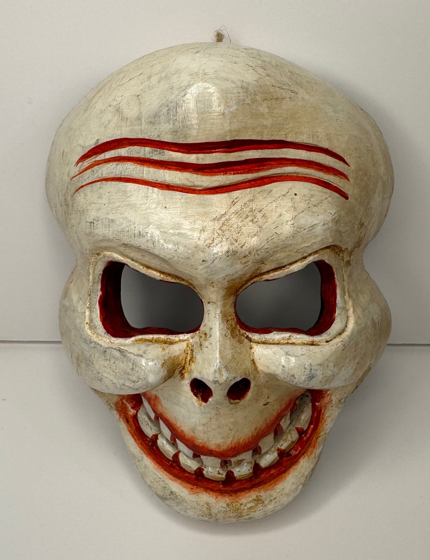 Hand-Carved Wooden Mask with Distinctive Grinning Design – Unique Artisan Craft