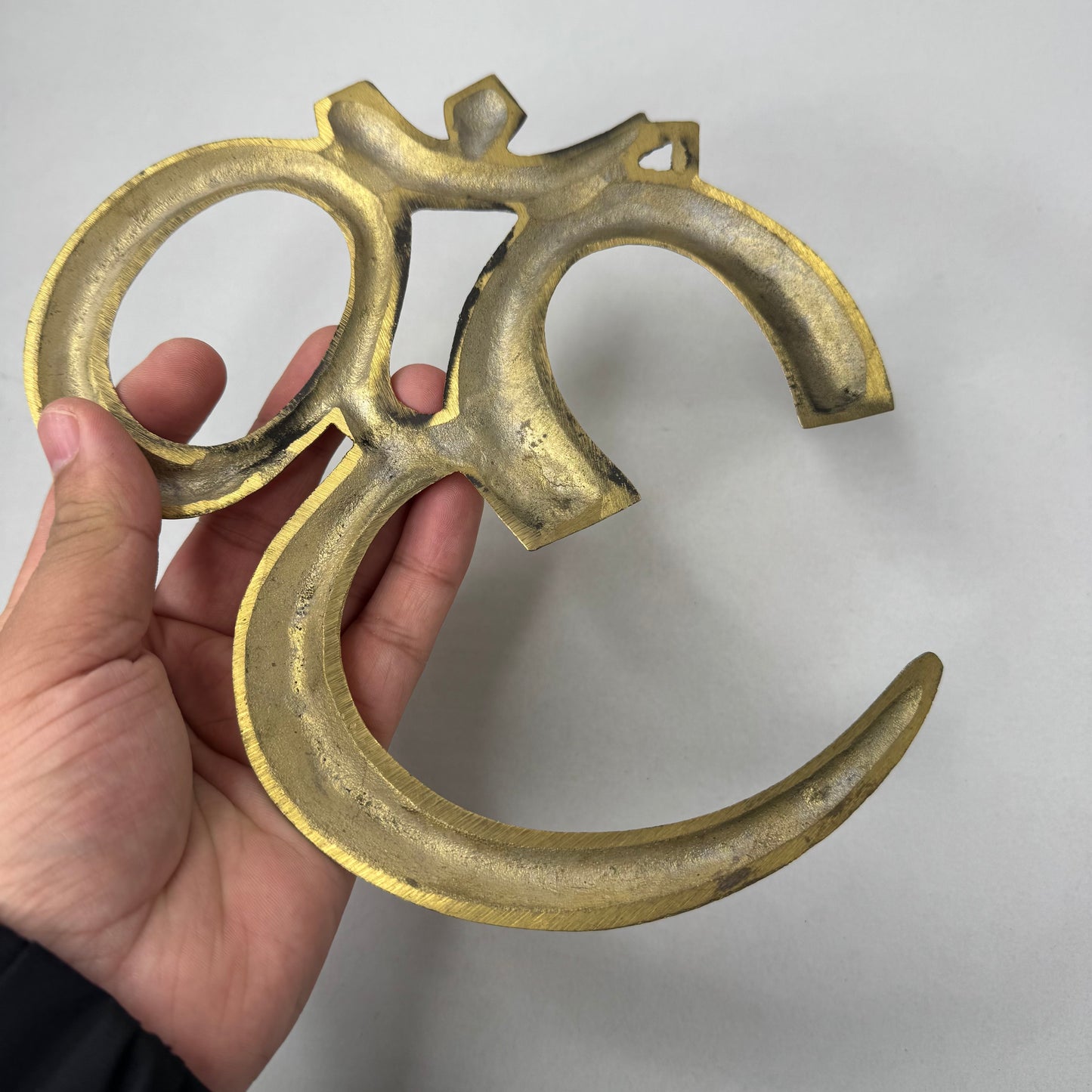 Handcrafted Brass Om Wall Décor – Spiritual and Elegant
