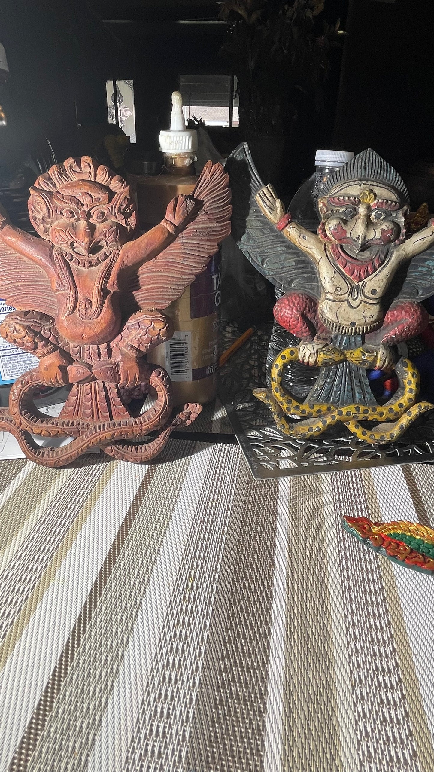 Wooden bird masks with snake( price each)