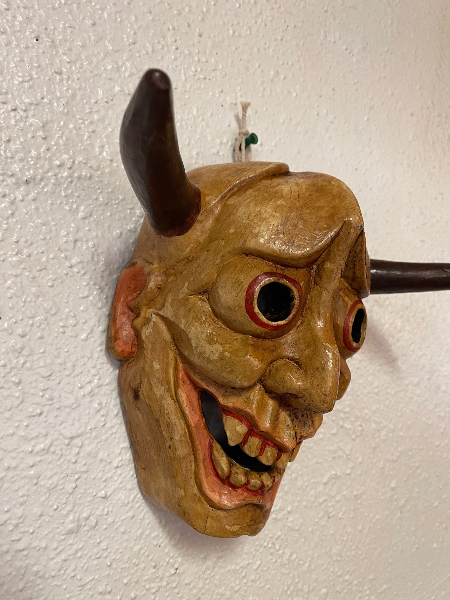 Wood mask with horns